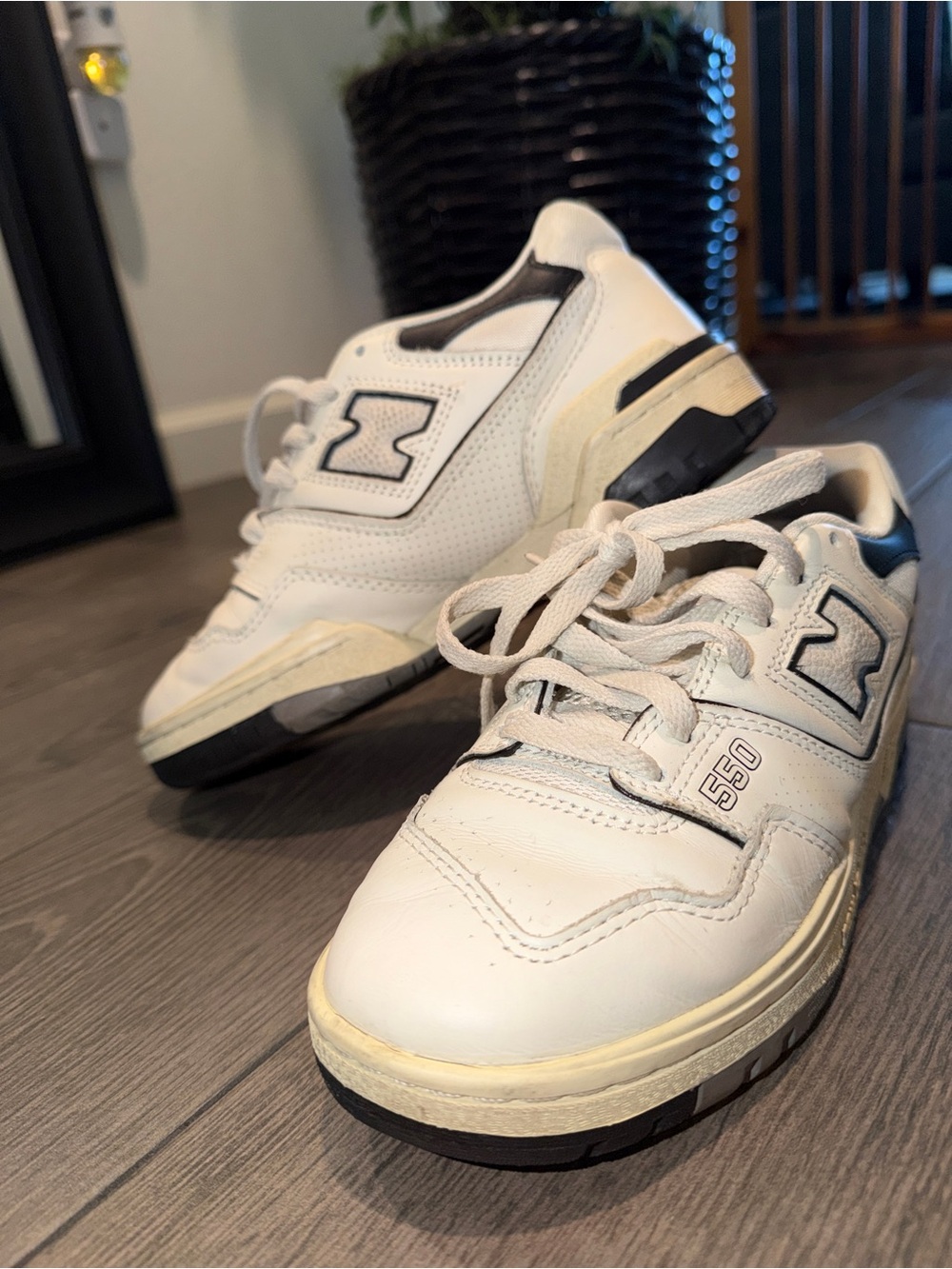 New Balance White and Black 550 Sneakers